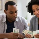 Couple counting money