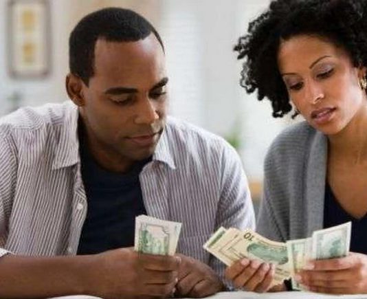 Couple counting money