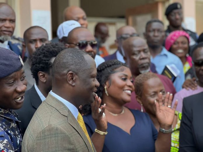 Jomoro MP Dorcas Affo-Toffey, flanked by some NDC members