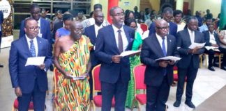 The newly elected fellows of the Ghana Academy of Arts and Sciences (GAAS) reading the declaration act. PICTURE: MAXWELL OCLOO