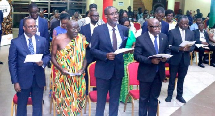 The newly elected fellows of the Ghana Academy of Arts and Sciences (GAAS) reading the declaration act. PICTURE: MAXWELL OCLOO