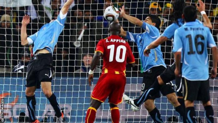 Luis Suarez was shown a straight red card for this handball against Ghana that saved a certain goal in the 2010 World Cup quarter-finals