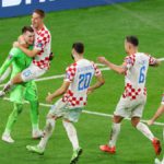 Dominik Livakovic and Mario Pasalic of Croatia celebrate after their side won the penalty shoot out during the FIFA World Cup Qatar 2022 Round of 16 match between Japan and Croatia at Al Janoub Stadium on December 05, 2022 in Al Wakrah, Qatar Image credit: Getty Images