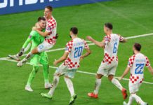 Dominik Livakovic and Mario Pasalic of Croatia celebrate after their side won the penalty shoot out during the FIFA World Cup Qatar 2022 Round of 16 match between Japan and Croatia at Al Janoub Stadium on December 05, 2022 in Al Wakrah, Qatar Image credit: Getty Images