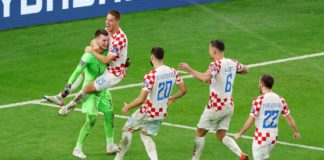 Dominik Livakovic and Mario Pasalic of Croatia celebrate after their side won the penalty shoot out during the FIFA World Cup Qatar 2022 Round of 16 match between Japan and Croatia at Al Janoub Stadium on December 05, 2022 in Al Wakrah, Qatar Image credit: Getty Images