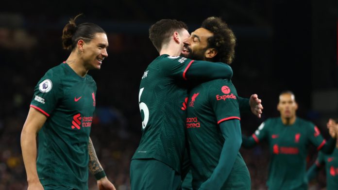 Mohamed Salah of Liverpool celebrates with teammates Darwin Nunez and Andy Robertson after scoring their side's first goal during the Premier League match between Aston Villa and Liverpool FC at Villa Park Image credit: Getty Images