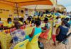 [File photo] Customers registering their SIM cards at Temporary Registration point at Madina market in Accra