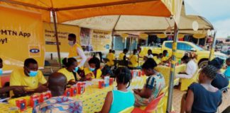 [File photo] Customers registering their SIM cards at Temporary Registration point at Madina market in Accra