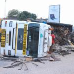 The truck as it lay on its side in the middle of the road