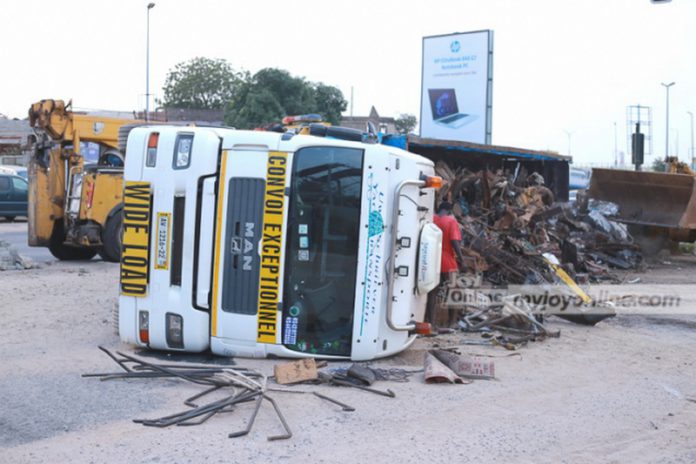 The truck as it lay on its side in the middle of the road