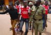 One fan was carrying a symbolic trophy which they had bought at a store JACOBS ODONGO SEAMAN