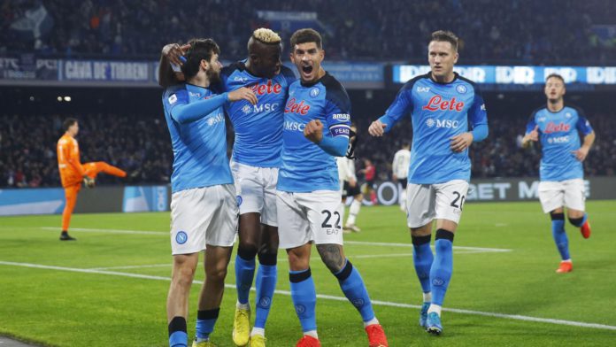 Victor Osimhen of SSC Napoli celebrates after scoring his team's first goal with team mates during the Serie A match between SSC Napoli_Juventus at Stadio Diego Armando Maradona on January 13, 2023 in Naples, Italy. (Photo by Matteo Ciambelli/DeFodi Image Image credit: Getty Images