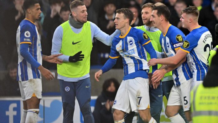 Brighton's English midfielder Solly March (C) celebrates with teammates after scoring their second goal during the English Premier League football match between Brighton and Hove Albion and Liverpool at the American Express Community Stadium in Brighton Image credit: Getty Images