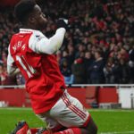 Arsenal's English striker Eddie Nketiah celebrates after scoring their third goal during the English Premier League football match between Arsenal and Manchester United at the Emirates Stadium Image credit: Getty Images
