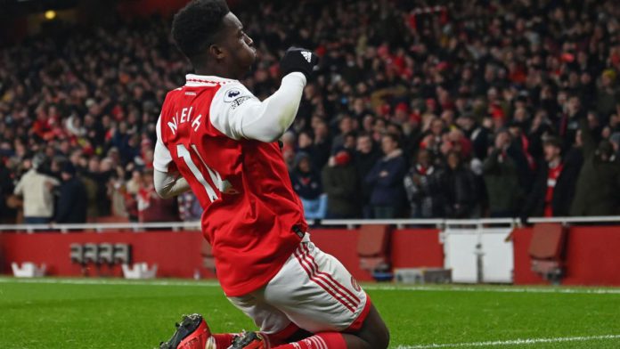 Arsenal's English striker Eddie Nketiah celebrates after scoring their third goal during the English Premier League football match between Arsenal and Manchester United at the Emirates Stadium Image credit: Getty Images