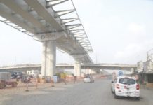 • The second flyover currently under construction at the Obetsebi Lamptey Interchange source: Daily Graphic