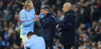 Erling Haaland (left) was taken off at half-time against Aston Villa and is a doubt for Wednesday's key game against Arsenal