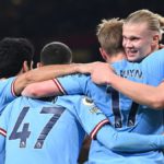 Manchester City's Norwegian striker Erling Haaland (R) celebrates with teammates after scoring his team third goal during the English Premier League football match between Arsenal and Manchester City at the Emirates Stadium in London on February 15, 2023 Image credit: Getty Images