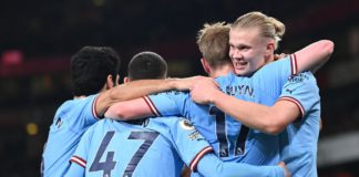 Manchester City's Norwegian striker Erling Haaland (R) celebrates with teammates after scoring his team third goal during the English Premier League football match between Arsenal and Manchester City at the Emirates Stadium in London on February 15, 2023 Image credit: Getty Images