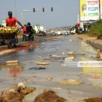 An overflow of toxic waste water on a portion of Mallam Junction Kasoa road at SCC Junction