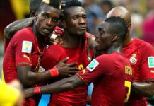 Asamoah Gyan celebrates with Christian Atsu