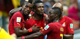 Asamoah Gyan celebrates with Christian Atsu