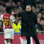 Kudus Mohammed [L] and John Heitinga [R]