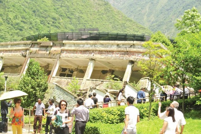 A collapsed building of the Junior High School at Yingxiu Town is now a memorial site