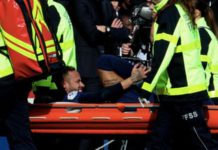 Neymar went over badly on his right ankle five minutes into the second half and was carried off on a stretcher in obvious pain
