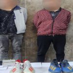 The alleged thieves with goods taken from the Egyptian home of Liverpool forward Mohamed Salah