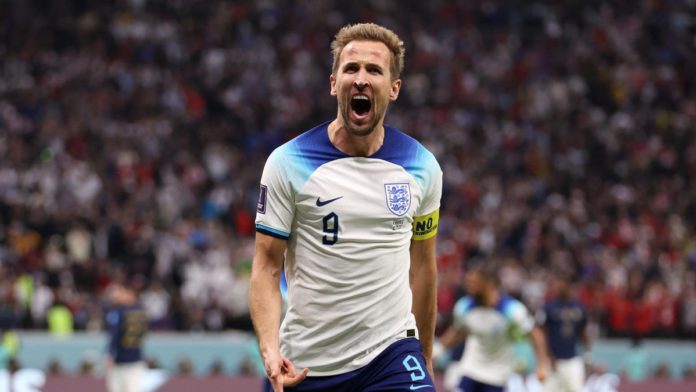 AL KHOR, QATAR - DECEMBER 10: Harry Kane of England celebrates after scoring the team's first goal via a penalty during the FIFA World Cup Qatar 2022 quarter final match between England and France at Al Bayt Stadium on December 10, 2022 in Al Khor, Qatar. Image credit: Getty Images