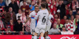 Raphinha of FC Barcelona celebrates with teammates after scoring the team's first goal during the LaLiga Santander match between Athletic Club and FC Barcelona at San Mames Stadium Image credit: Getty Images