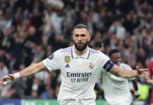 Real Madrid's French forward Karim Benzema celebrates scoring his team's first goal during the UEFA Champions League last 16 second leg football match between Real Madrid CF and Liverpool FC at the Santiago Bernabeu stadium in Madrid on March 15, 2023. (P Image credit: Getty Images