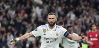 Real Madrid's French forward Karim Benzema celebrates scoring his team's first goal during the UEFA Champions League last 16 second leg football match between Real Madrid CF and Liverpool FC at the Santiago Bernabeu stadium in Madrid on March 15, 2023. (P Image credit: Getty Images