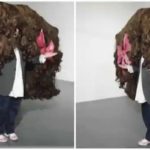 Photos of the widest wig. Credit: @guinnessworldrecords