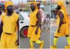 Ras Nene Dresses In Hilarious Yellow Outfit Photo Source: officialagooji