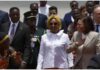 Shirley Ayorkor Botchwey in a white shirt, and Vice President Kamala Harris stuns in corporate wear. Source: @apnews