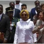 Shirley Ayorkor Botchwey in a white shirt, and Vice President Kamala Harris stuns in corporate wear. Source: @apnews
