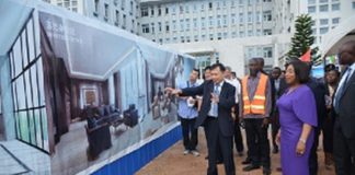 Ambassador Lu Kun showing Ms Shirley Ayorkor Botchwey and others round the proposed annex