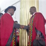 Prof. Robert Darko Osei (left), Dean, School of Graduate Studies, University of Ghana, congratulating Dr Bryan Acheampong, former Minister of State for National Security and Agric Minister designate, during the graduation ceremony. Picture: Maxwell Ocloo