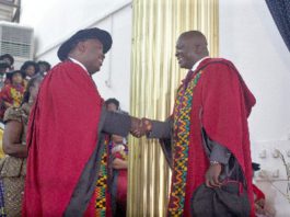 Prof. Robert Darko Osei (left), Dean, School of Graduate Studies, University of Ghana, congratulating Dr Bryan Acheampong, former Minister of State for National Security and Agric Minister designate, during the graduation ceremony. Picture: Maxwell Ocloo