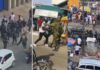 Armed police officers and soldiers clash