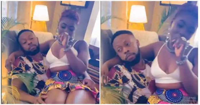 Kalybos pampering Ahuofe Patricia on her birthday by letting her sit on his lap Photo source: @kalybos1 Kalybos pampering Ahuofe Patricia on her birthday by letting her sit on his lap Photo source: @kalybos1