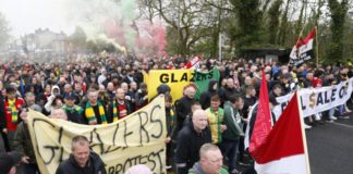 Manchester United fans marched from the city centre to the club's Old Trafford stadium