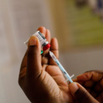 A nurse fills a syringe with malaria vaccine before administering it to an infant at the Lumumba Sub-County hospital in Kisumu, Kenya, July 1, 2022. REUTERS/Baz Ratner