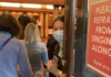 Signs at Manchester's Palace theatre ask audience members not to sing along during The Bodyguard