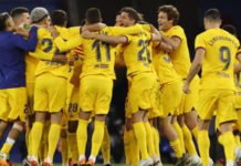 Barcelona's players celebrated on the pitch after claiming their 27th La Liga championship