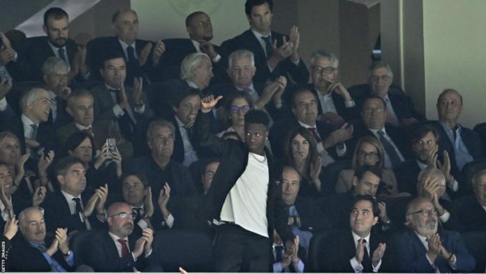 The Real Madrid fans applauded and chanted Vinicius Jr's name in the 20th minute