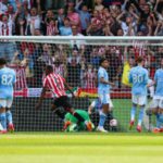 Ethan Pinnock's cool finish ended Manchester City's 25-match unbeaten run - but it wasn't enough to earn the Bees a Europa Conference League spot