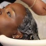 Using warm water to wash the hair opens the pores to rid the hair of dirt